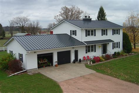 grey metal roof white house|white house charcoal trim.